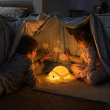 Children enjoying a gentle blanket-den night with Tidelune