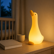 Anseria goose night light glowing on a nursery bedside table – image 5