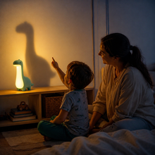 DinoDream silicone dinosaur night light with USB charging cable