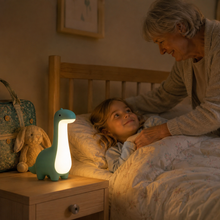DinoDream dinosaur night light comforting a child at grandparents’ house