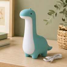 DinoDream dinosaur night light creating a gentle wall shadow