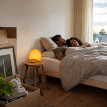 NatureRise sunrise clock on a couple’s first morning in a new home