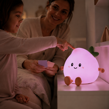 Child choosing one of PeachLume's seven RGB colours